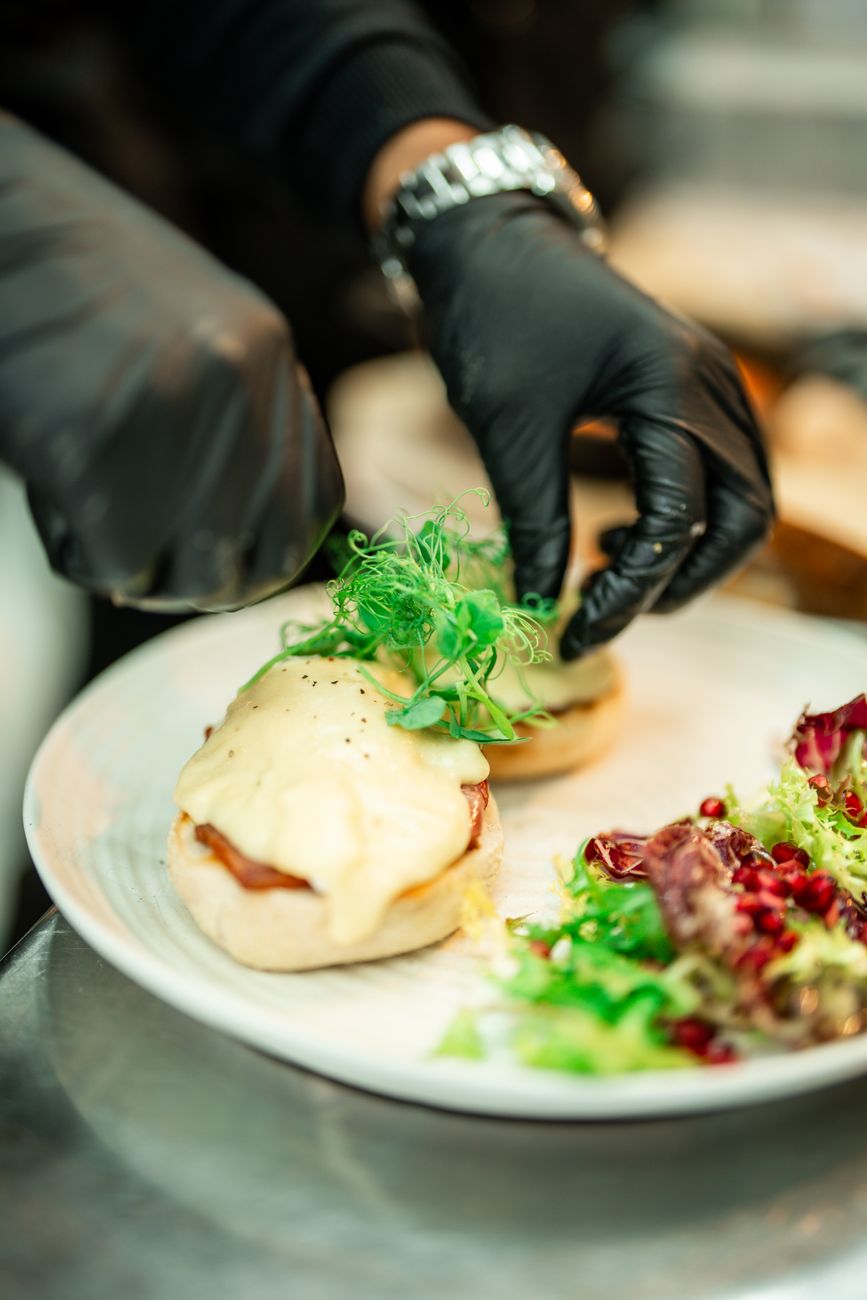 Chef plating local foraged ingredients